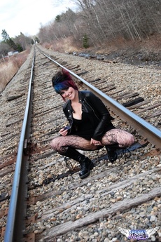 Goth Babe Sabrina Shows Off Her Perfect Round Ass In Black Lace With A Matching Thong Outdoors On The Railroad Tracks