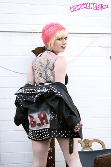 Punk Whore In Jacket Strips Outside