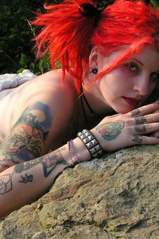 Inked Metal Redhead Strips Down Outdoors