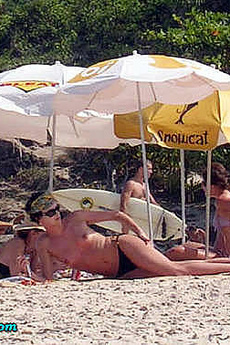Charlize Theron Topless Sunbathing In Thong Bikini