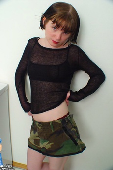 Teen Doing Laundry Drops Camouflage Skirt Spreads