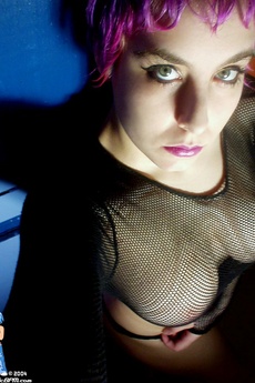 Purple Haired Chick In Black Fishnet Gets Naked