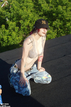 Hip Chick Strips And Spreads Wide On Rooftop