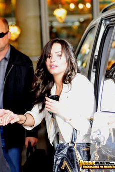 Demi Lovato In Glamorous And Paparazzi Photos
